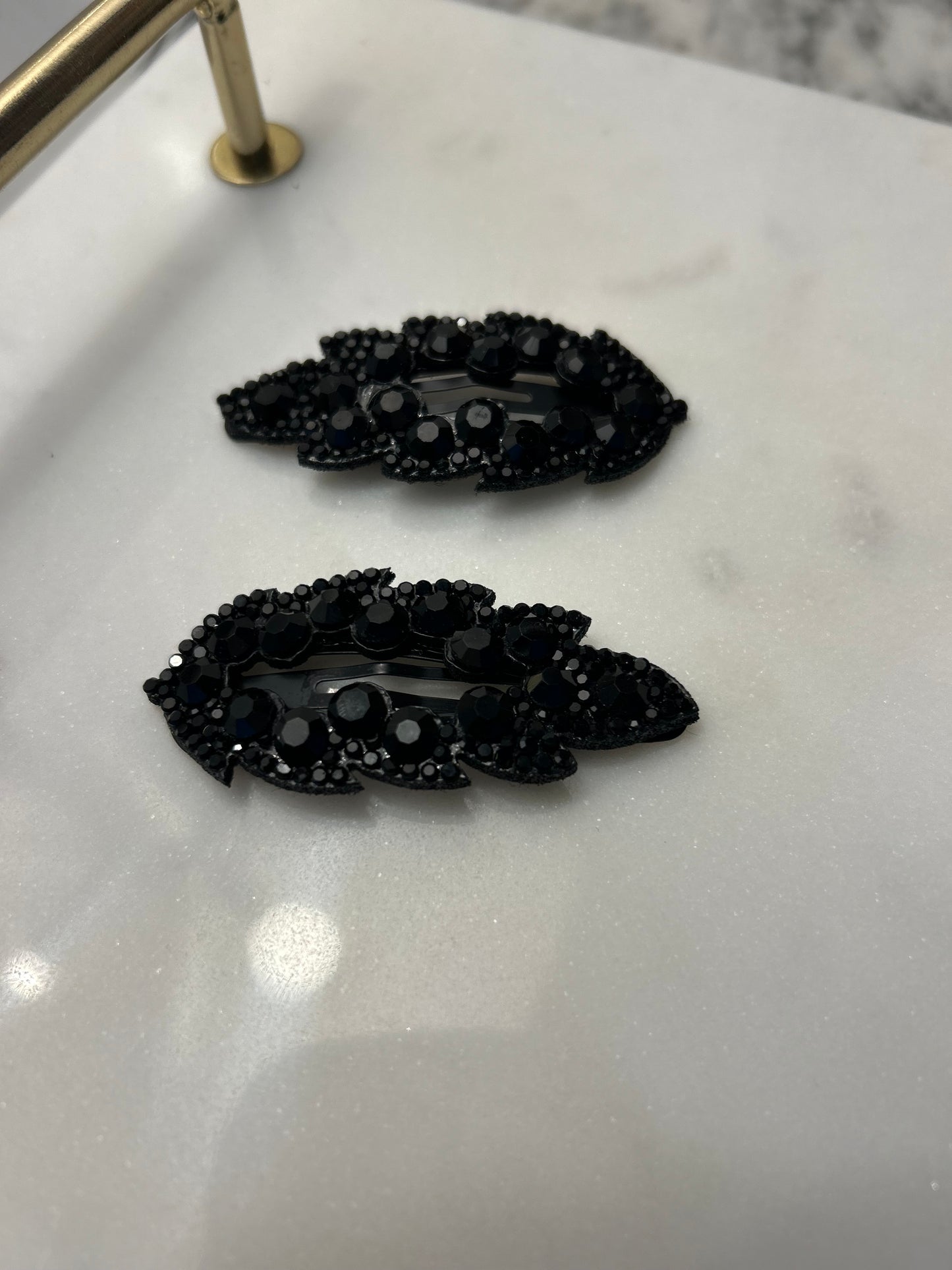 Lot de 2 barrettes à strass noir feuilles